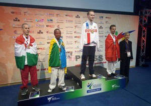 Jean-de-la-Croix-Nikwigize-on-the-podium-as-he-won-the-bronze-medal-at-the-World-Para-Taekwondo-Championship-in-London-1024x720