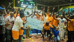 gisagara-volleyball-club-receives-the-trophy-from-the-senate-president-honourable-bernard-makuza-last-night-at-petit-stadium